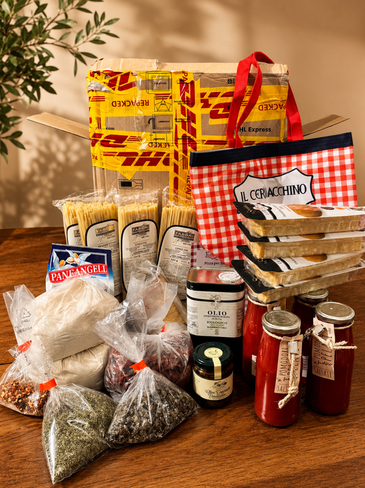 Italian food box with ancient grain pasta, 100% grain Italiano, fresh Parmigiano reggiano (parmesan) from Ital100% really Italian tomatoes and tomato sauce, 100% italian flour, fresh Italian olive oil, Italian herbs and spices